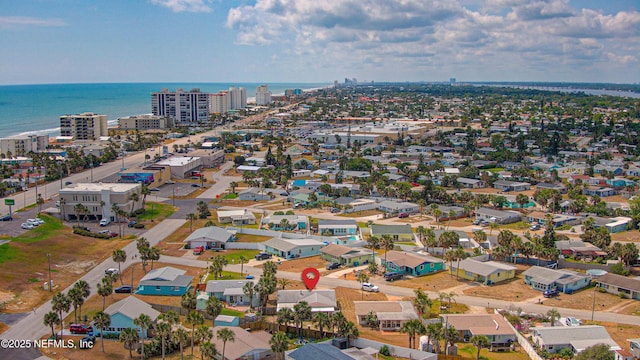 view of urban area with a nearby body of water