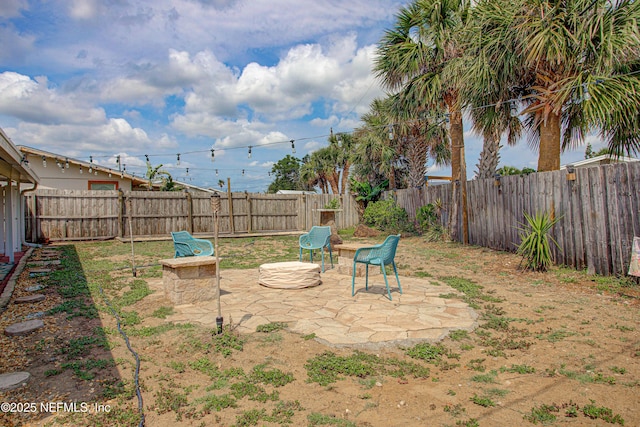 fenced backyard featuring a patio area