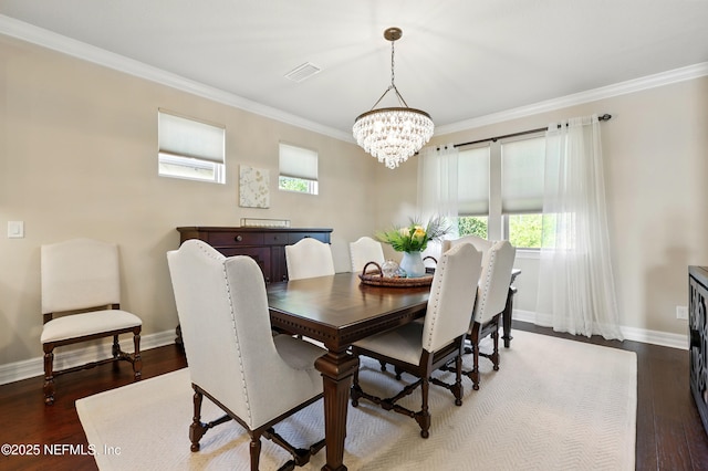 123 Tree Side Ln, Ponte Vedra, FL 32081 - dining room with a chandelier, ornamental molding, wood finished floors, and baseboards