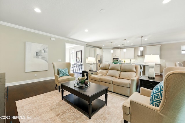 123 Tree Side Ln, Ponte Vedra, FL 32081 - living area featuring recessed lighting, ornamental molding, baseboards, and light wood-style floors