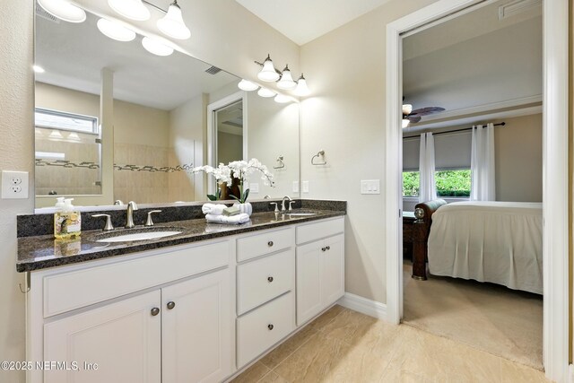 123 Tree Side Ln, Ponte Vedra, FL 32081 - ensuite bathroom with healthy amount of natural light, double vanity, walk in shower, and baseboards