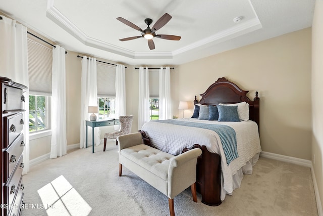 123 Tree Side Ln, Ponte Vedra, FL 32081 - bedroom with a raised ceiling, light carpet, crown molding, baseboards, and a ceiling fan