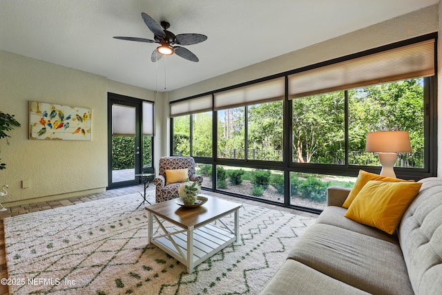 123 Tree Side Ln, Ponte Vedra, FL 32081 - living room featuring a ceiling fan and a textured wall