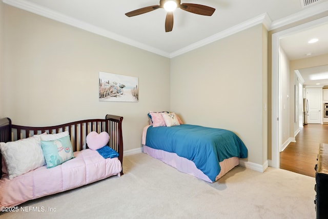 123 Tree Side Ln, Ponte Vedra, FL 32081 - bedroom featuring crown molding, carpet, baseboards, stainless steel refrigerator, and a ceiling fan