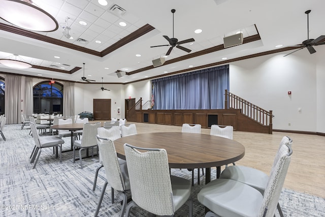 123 Tree Side Ln, Ponte Vedra, FL 32081 - dining space featuring ceiling fan, crown molding, a raised ceiling, recessed lighting, and a high ceiling