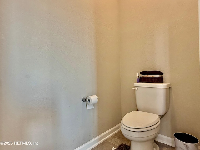 195 Torres Trce, Saint Augustine, FL 32095 - bathroom featuring baseboards, toilet, and tile patterned flooring