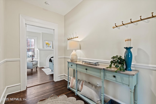 3577 Valencia Rd, Jacksonville, FL 32205 - hall featuring dark wood-type flooring and baseboards