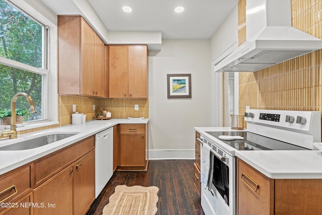 3577 Valencia Rd, Jacksonville, FL 32205 - kitchen with custom exhaust hood, white appliances, a sink, dark wood finished floors, and baseboards