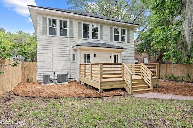 3577 Valencia Rd, Jacksonville, FL 32205 - back of house featuring a deck, central AC unit, and a shingled roof