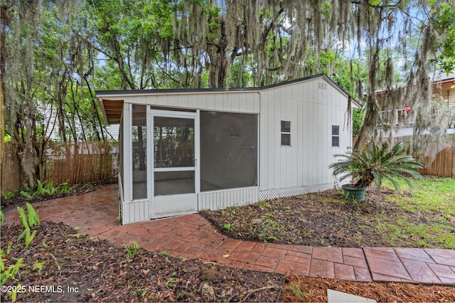 3577 Valencia Rd, Jacksonville, FL 32205 - view of outbuilding featuring a sunroom and fence