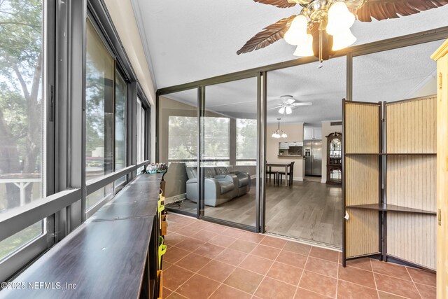 1071 Edgewood Ave S Unit 206, Jacksonville, FL 32205 - sunroom featuring ceiling fan and healthy amount of natural light