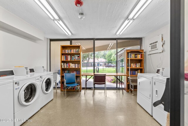 1071 Edgewood Ave S Unit 206, Jacksonville, FL 32205 - shared laundry featuring independent washer and dryer and a wall mounted AC