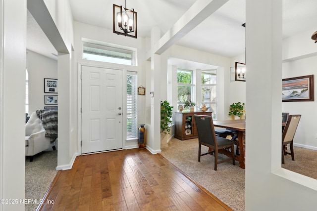 364 Maplewood Dr, Saint Johns, FL 32259 - entryway featuring a chandelier, hardwood / wood-style flooring, and baseboards