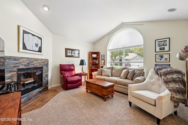 364 Maplewood Dr, Saint Johns, FL 32259 - carpeted living area with lofted ceiling and a fireplace