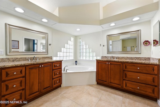 364 Maplewood Dr, Saint Johns, FL 32259 - full bath featuring two vanities, a garden tub, recessed lighting, and tile patterned flooring