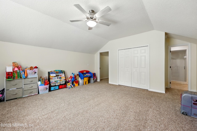 364 Maplewood Dr, Saint Johns, FL 32259 - recreation room featuring vaulted ceiling, carpet floors, a ceiling fan, a textured ceiling, and baseboards