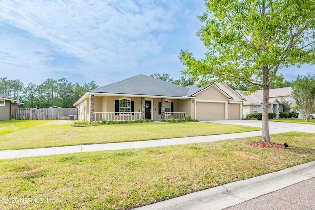2443 Royal Pointe Dr, Green Cove Springs, FL 32043 - ranch-style home featuring a porch, an attached garage, driveway, and stucco siding