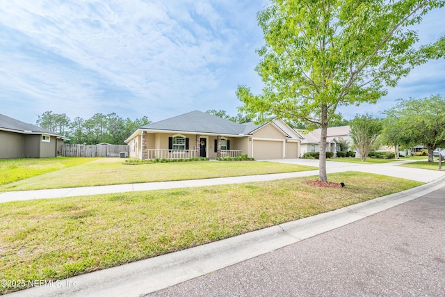 2443 Royal Pointe Dr, Green Cove Springs, FL 32043 - single story home with a porch, driveway, and a garage