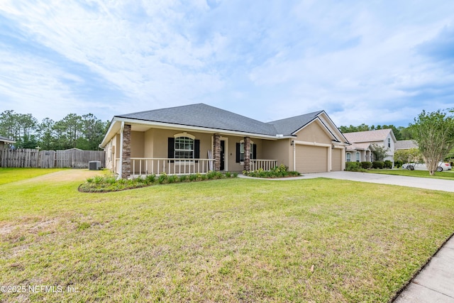 2443 Royal Pointe Dr, Green Cove Springs, FL 32043 - ranch-style house with a porch, concrete driveway, stucco siding, and a garage