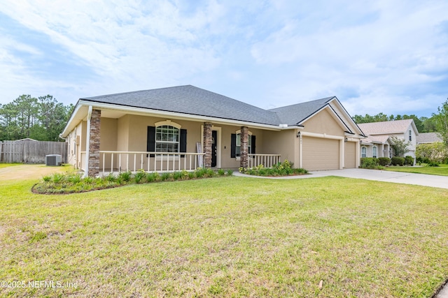 2443 Royal Pointe Dr, Green Cove Springs, FL 32043 - single story home featuring stucco siding, covered porch, central AC, a garage, and concrete driveway