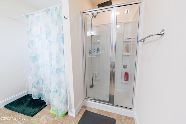 2443 Royal Pointe Dr, Green Cove Springs, FL 32043 - full bath with a shower stall, baseboards, and tile patterned floors