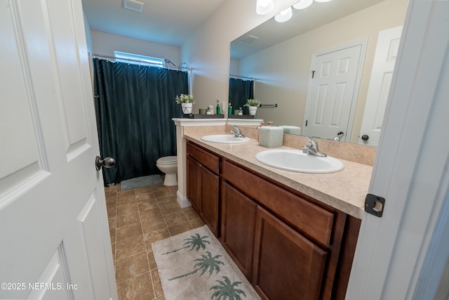 2443 Royal Pointe Dr, Green Cove Springs, FL 32043 - full bath featuring tile patterned floors, double vanity, toilet, and curtained shower