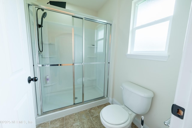 2443 Royal Pointe Dr, Green Cove Springs, FL 32043 - full bath featuring a stall shower, toilet, and baseboards