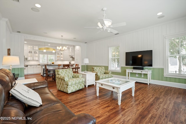 195 S Roscoe Blvd, Ponte Vedra Beach, FL 32082 - living area featuring ornamental molding, dark wood-style floors, ceiling fan, and a chandelier