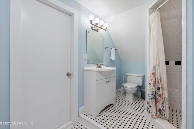 195 S Roscoe Blvd, Ponte Vedra Beach, FL 32082 - full bath featuring toilet, vanity, a stall shower, vaulted ceiling, and baseboards