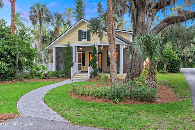 195 S Roscoe Blvd, Ponte Vedra Beach, FL 32082 - view of front facade featuring a front lawn and covered porch