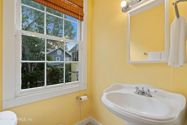 195 S Roscoe Blvd, Ponte Vedra Beach, FL 32082 - half bath with a sink, baseboards, and toilet