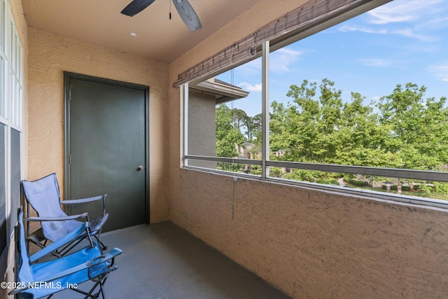 1655 The Greens Way Unit 2432, Jacksonville Beach, FL 32250 - balcony featuring a ceiling fan