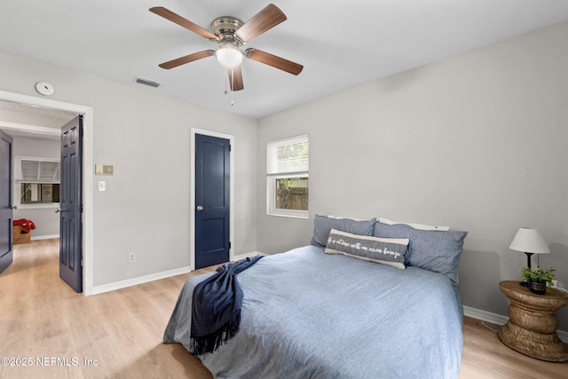 5164 Marlene Ave, Jacksonville, FL 32210 - bedroom with light wood-style floors, baseboards, and a ceiling fan