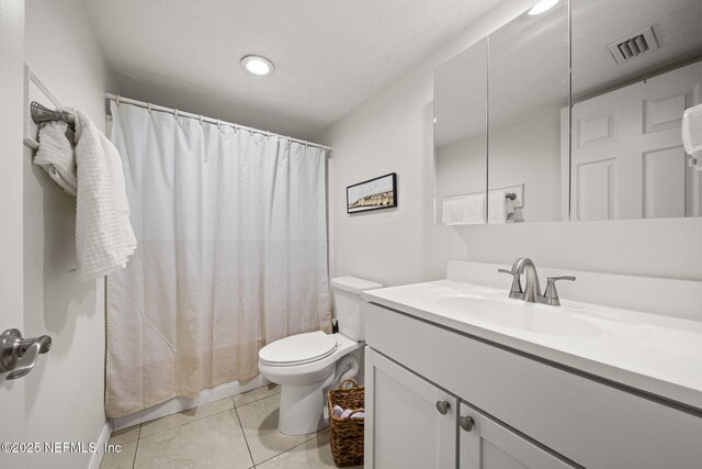 7175 A1A S Unit A108, Saint Augustine, FL 32080 - full bath with tile patterned floors, toilet, vanity, and recessed lighting