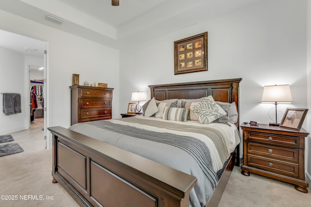 836 Margaritaville Ave, Daytona Beach, FL 32124 - bedroom featuring light carpet, a spacious closet, a closet, and ceiling fan