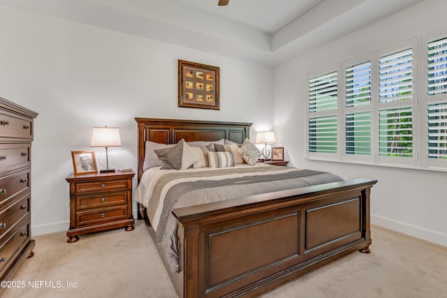 836 Margaritaville Ave, Daytona Beach, FL 32124 - bedroom featuring light colored carpet, baseboards, and a raised ceiling