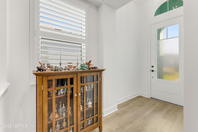 836 Margaritaville Ave, Daytona Beach, FL 32124 - foyer with light wood finished floors and baseboards