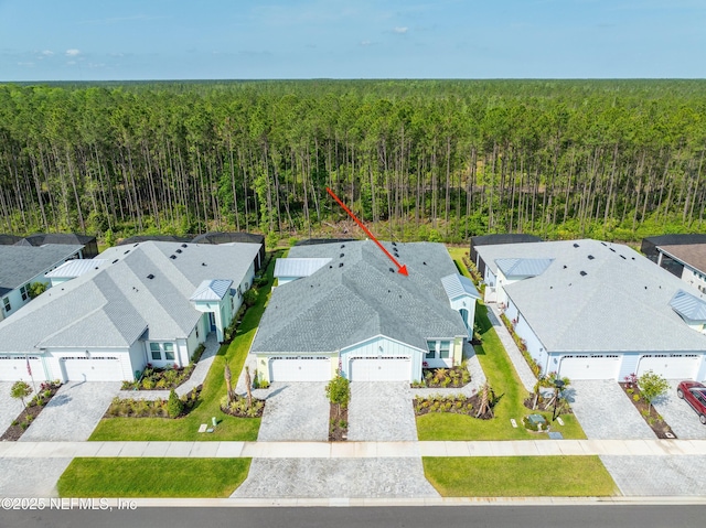 836 Margaritaville Ave, Daytona Beach, FL 32124 - aerial view of residential area featuring a heavily wooded area