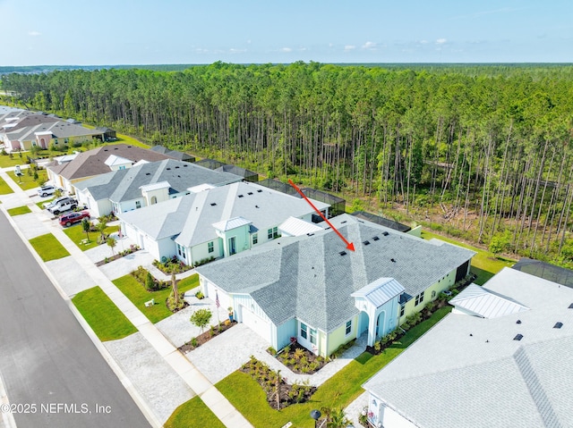 836 Margaritaville Ave, Daytona Beach, FL 32124 - aerial view of residential area with a heavily wooded area