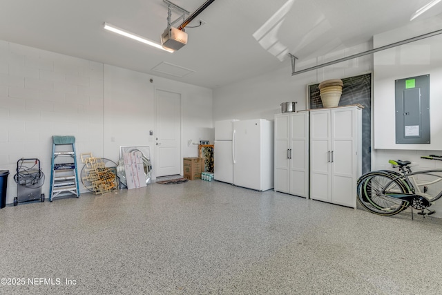 836 Margaritaville Ave, Daytona Beach, FL 32124 - garage featuring freestanding refrigerator, electric panel, and a garage door opener