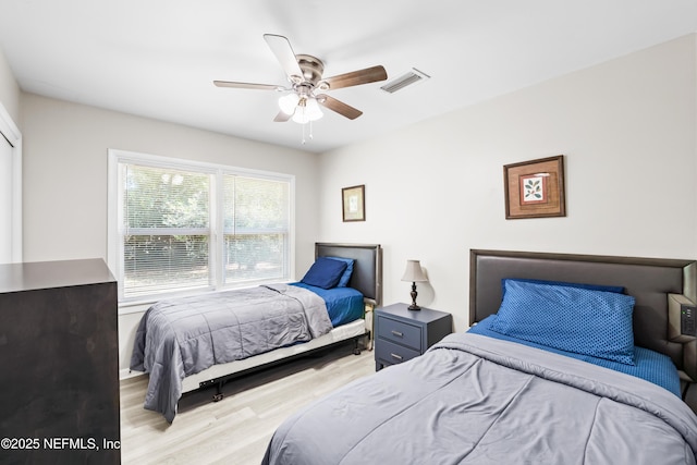 7315 Wonder Ln, Jacksonville, FL 32244 - bedroom with wood finished floors and ceiling fan
