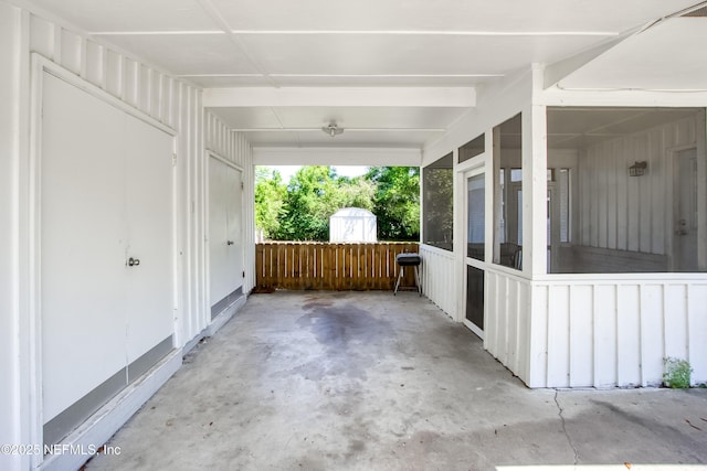 7315 Wonder Ln, Jacksonville, FL 32244 - view of patio / terrace featuring a sunroom