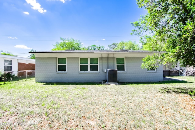 7315 Wonder Ln, Jacksonville, FL 32244 - rear view of house with central air condition unit and brick siding