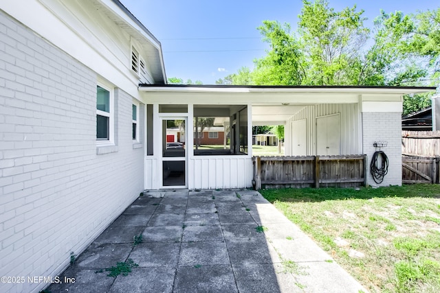 7315 Wonder Ln, Jacksonville, FL 32244 - view of patio with a sunroom