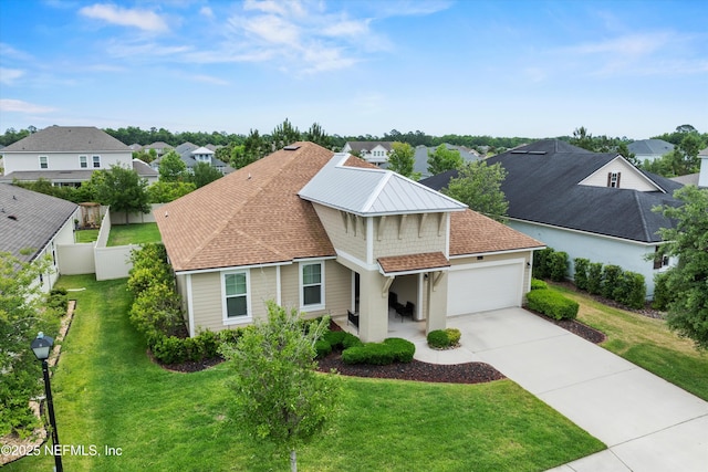 213 Haas Ave, Saint Augustine, FL 32095 - traditional-style house featuring an attached garage, a residential view, concrete driveway, and a shingled roof