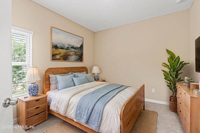 213 Haas Ave, Saint Augustine, FL 32095 - bedroom featuring baseboards and light tile patterned floors