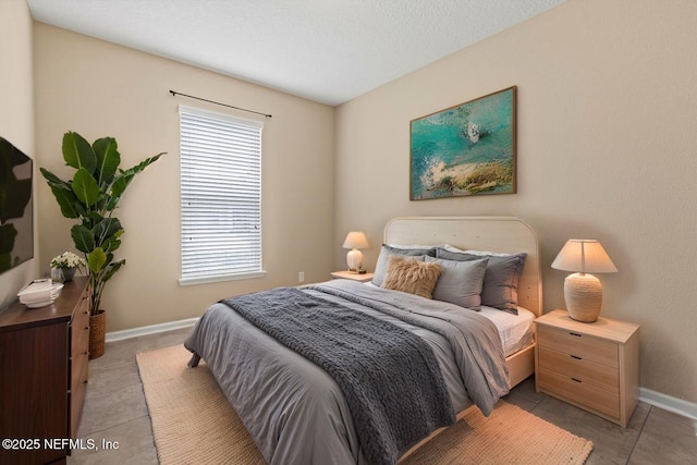 213 Haas Ave, Saint Augustine, FL 32095 - bedroom with multiple windows, baseboards, and light tile patterned floors