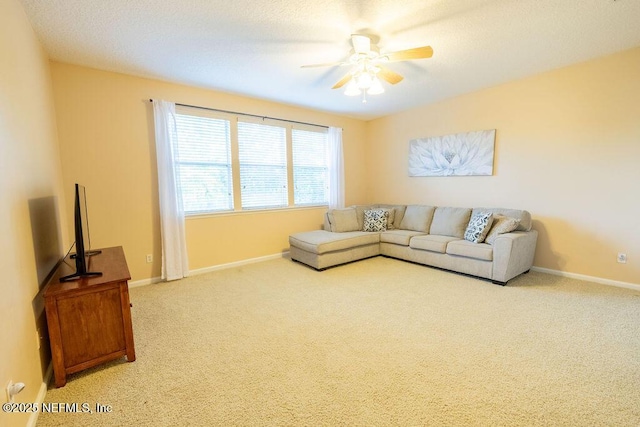 2543 Willow Creek Dr, Fleming Island, FL 32003 - living room with a ceiling fan, carpet, and baseboards
