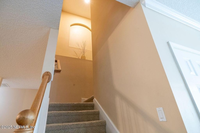 2543 Willow Creek Dr, Fleming Island, FL 32003 - stairs featuring a textured ceiling