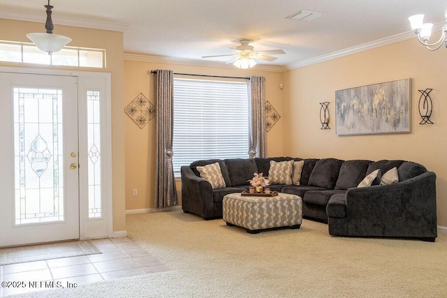 2543 Willow Creek Dr, Fleming Island, FL 32003 - living room with carpet floors, crown molding, a ceiling fan, baseboards, and tile patterned floors